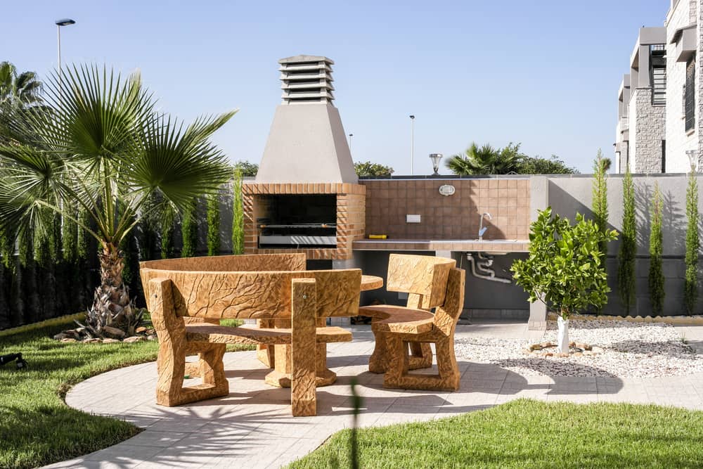 BBQ area in a Spanish garden, with seating and washinup area