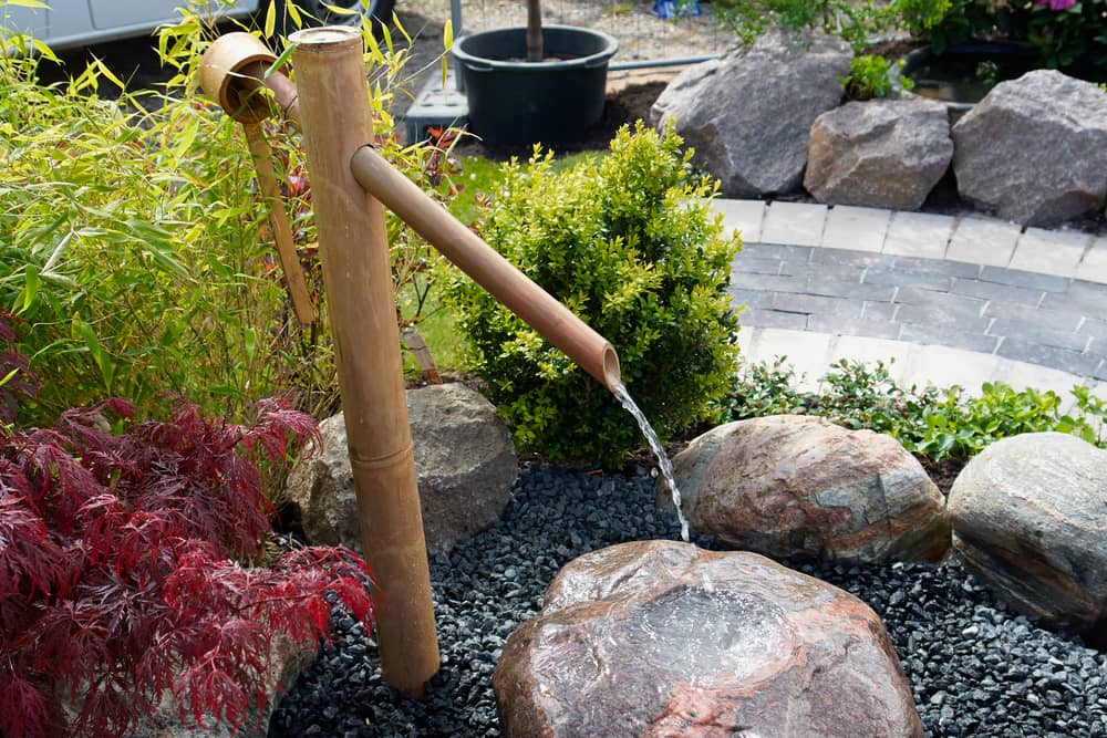 Japanese home garden bamboo waterfall pond