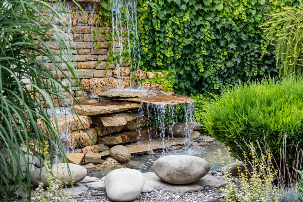 A small decorative waterfall in the garden