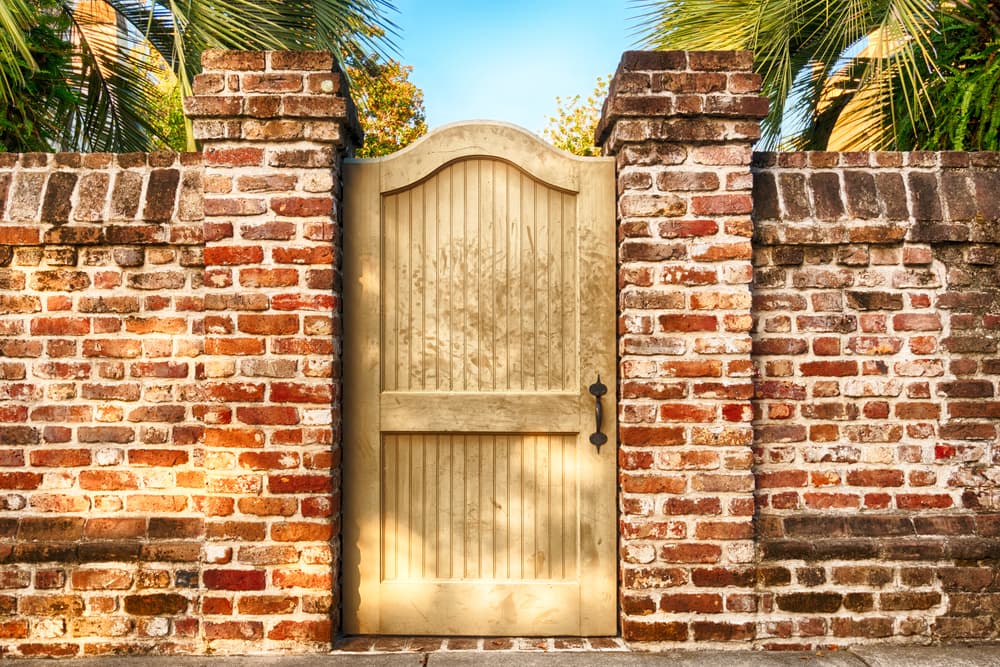 gate in a brick wall