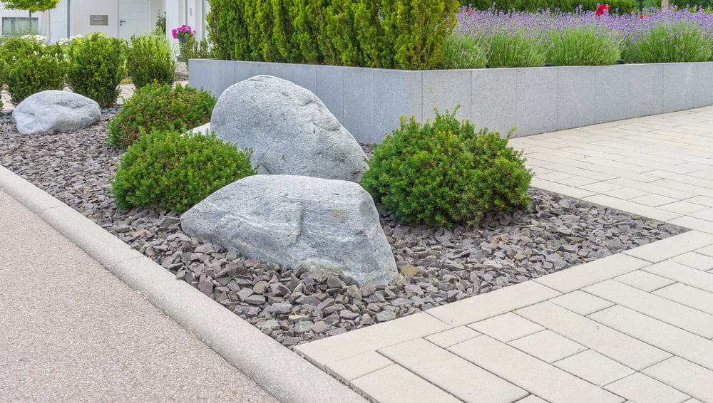 rock-garden-with-green-bushes