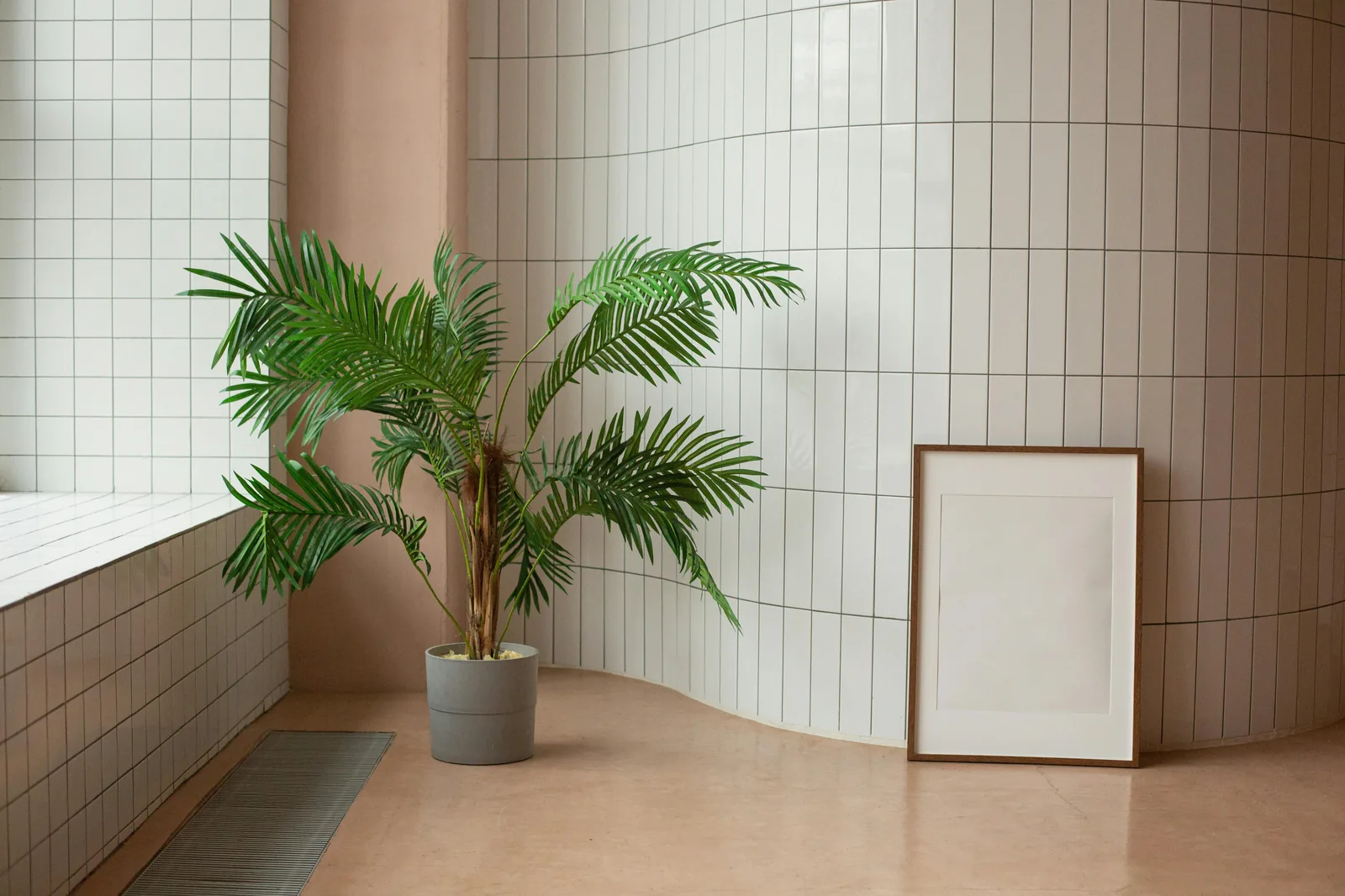 Palm placed near a mock-up poster.jpg