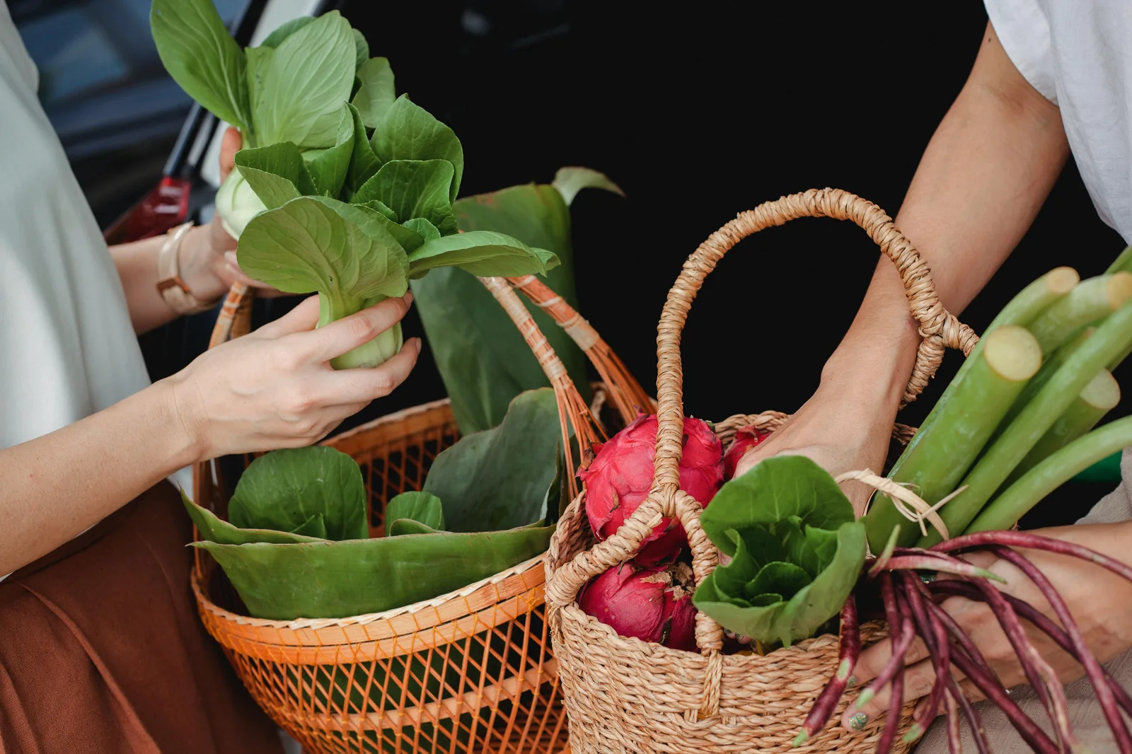 Fresh garden vegetables in woven baskets