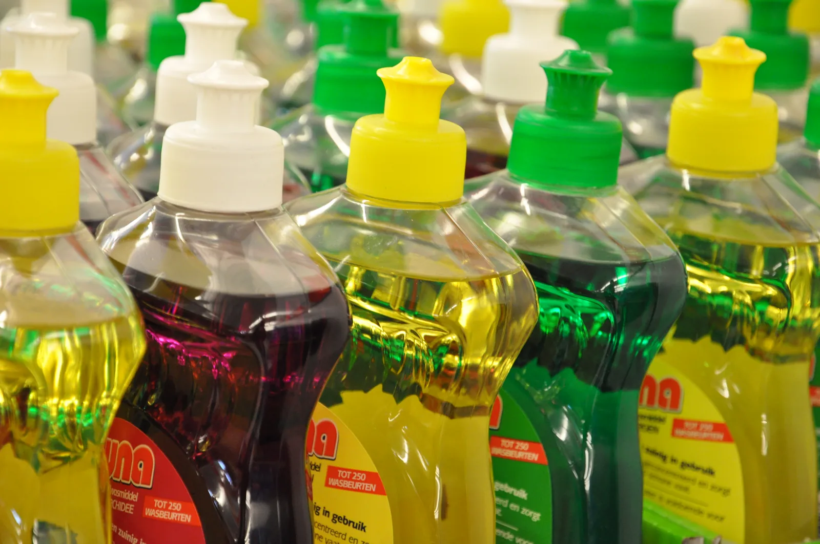 A row of various dish soaps