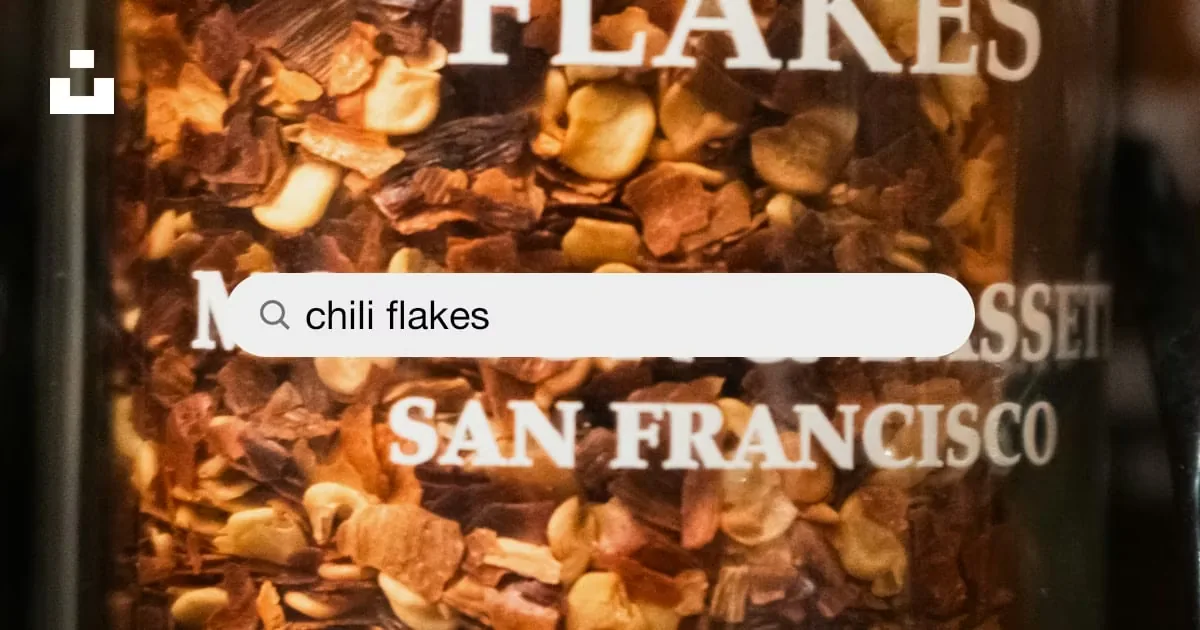 Red chili flakes and powder in bowls