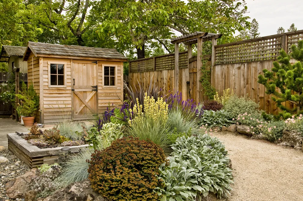 wooden shed with gravel path